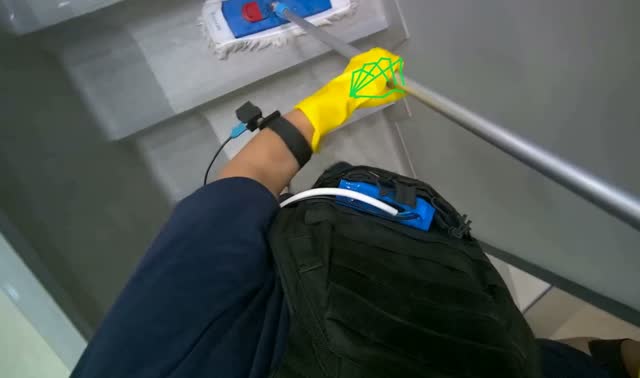 Mopping stairs with flat mop: egocentric robotics sample