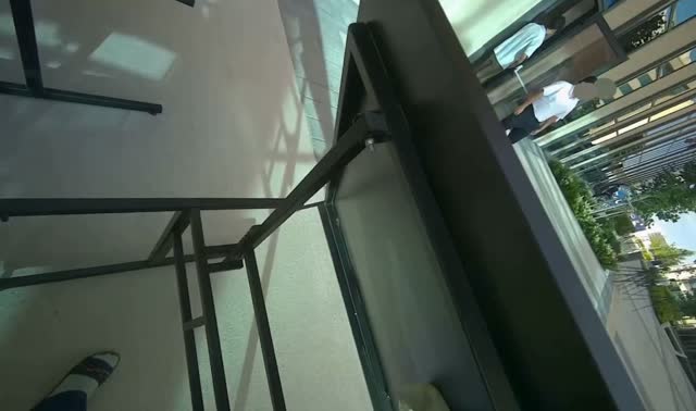 Wiping outdoor table frame and underside: egocentric robotics sample