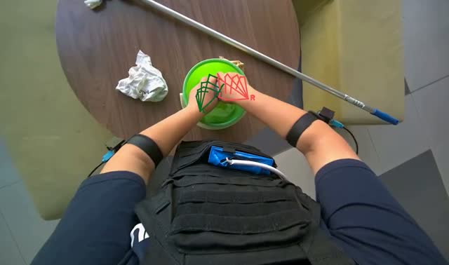 Wringing cleaning cloths: egocentric robotics sample