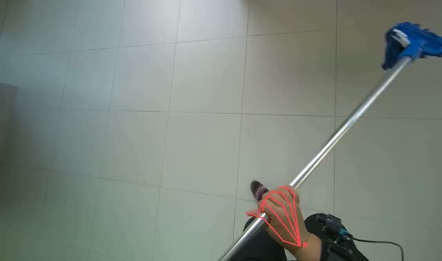 Mopping tiled floor with flat mop: egocentric robotics sample