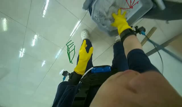Cleaning floor with mop: egocentric robotics sample