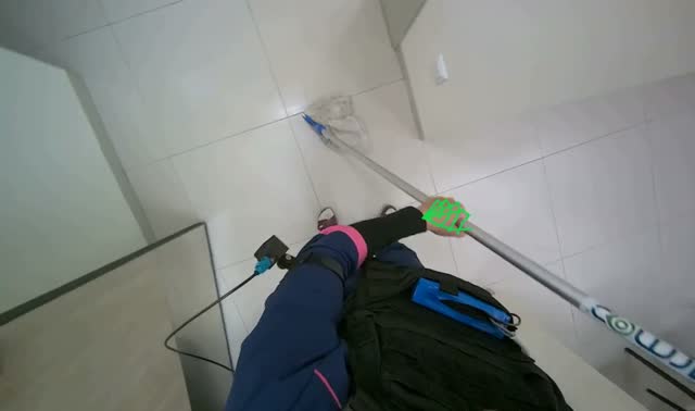 Mopping bathroom floor: egocentric robotics sample