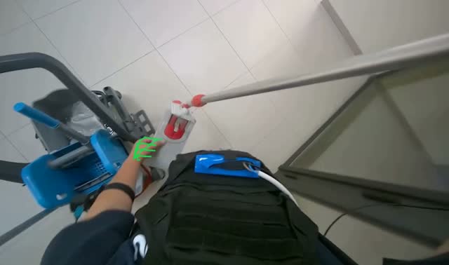 Cleaning and bagging mop head: egocentric robotics sample