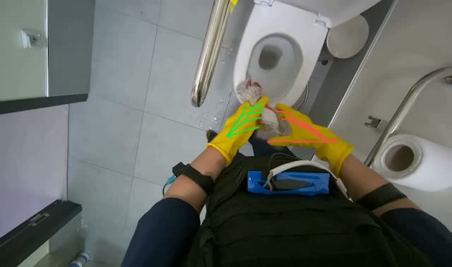 Cleaning mop head in sink: egocentric robotics sample