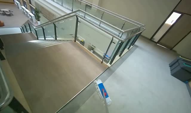 Mopping hallway floor: egocentric robotics sample