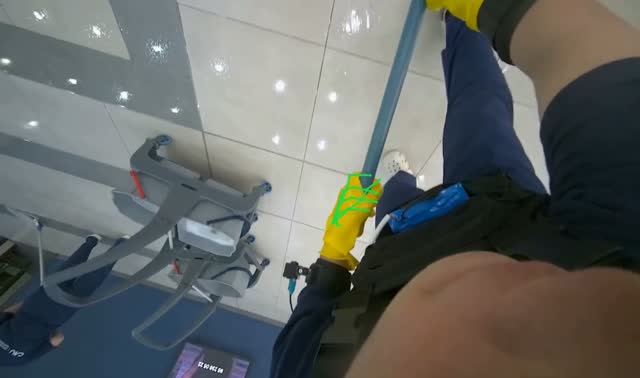 Mopping floor with mop: egocentric robotics sample