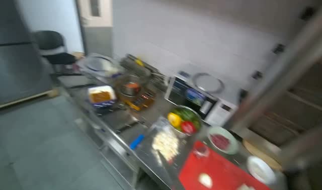 Chopping onions on cutting board: egocentric robotics sample