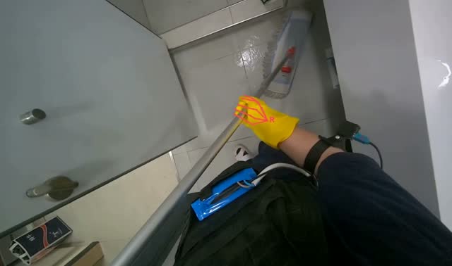 Mopping bathroom floor: egocentric robotics sample