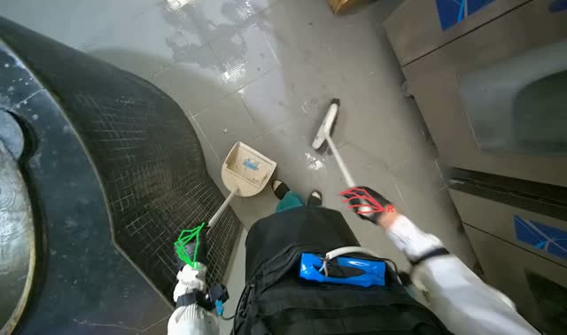 Sweeping kitchen floor: egocentric robotics sample