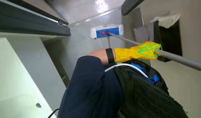 Mopping bathroom floor: egocentric robotics sample