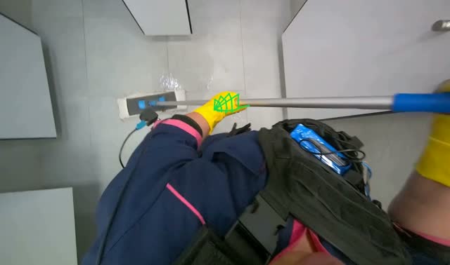 Mopping bathroom floor: egocentric robotics sample