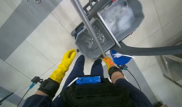 Preparing mop for cleaning: egocentric robotics sample