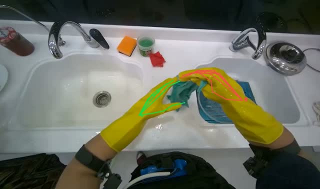 Washing metal grate in kitchen sink: egocentric robotics sample