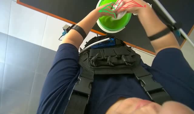 Wringing cloths into bucket: egocentric robotics sample