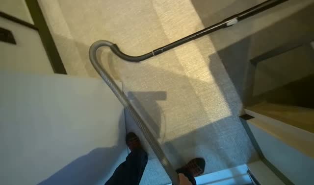 Vacuuming hallway floor: egocentric robotics sample