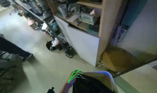 Lining trash can with new bag: egocentric robotics sample