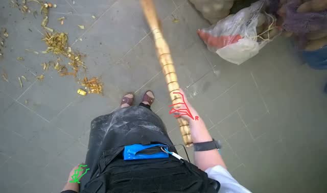 Sweeping floor debris with broom: egocentric robotics sample