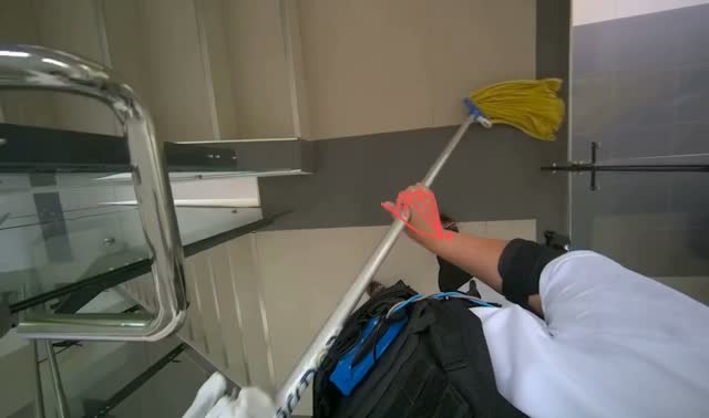 Mopping stairs with string mop: egocentric robotics sample