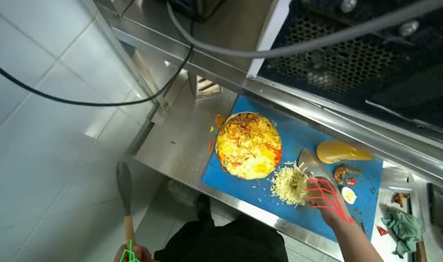 Adding cheese to cooked tortilla: egocentric robotics sample