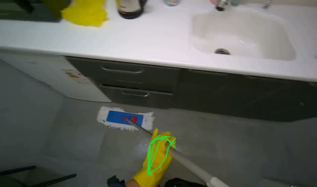 Mopping kitchenette floor: egocentric robotics sample