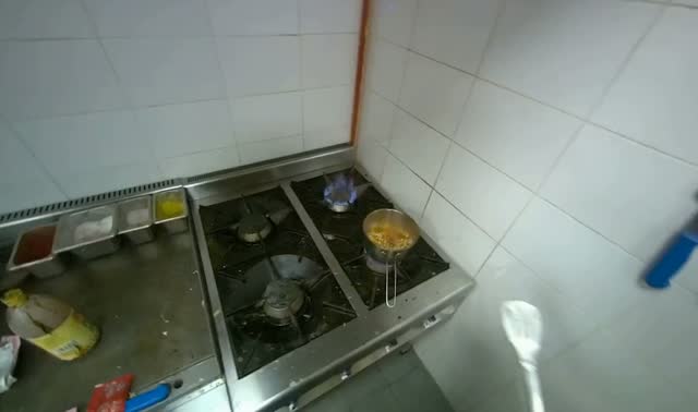 Cooking ingredients in pot: egocentric robotics sample