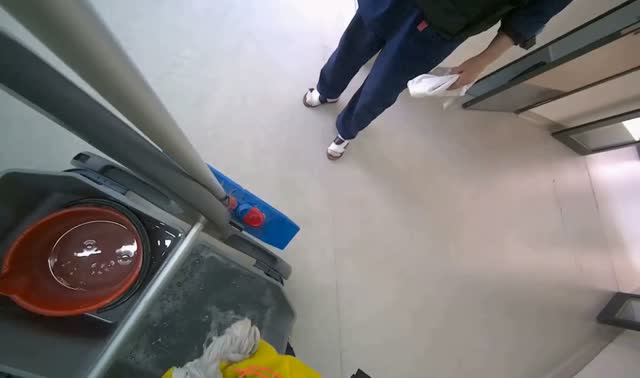 Preparing mop for cleaning: egocentric robotics sample