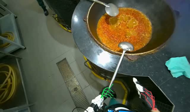 Wiping cooking area around pots: egocentric robotics sample