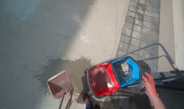 Washing broom and dustpan outside: egocentric robotics sample