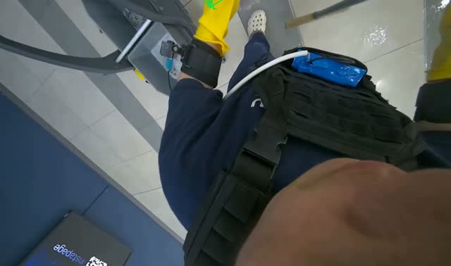 Mopping floor with mop: egocentric robotics sample