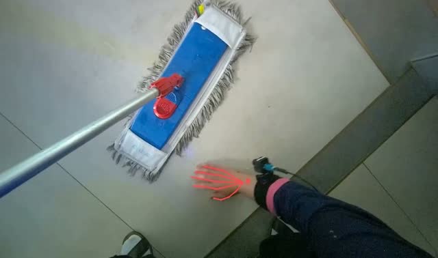 Picking up debris from floor: egocentric robotics sample