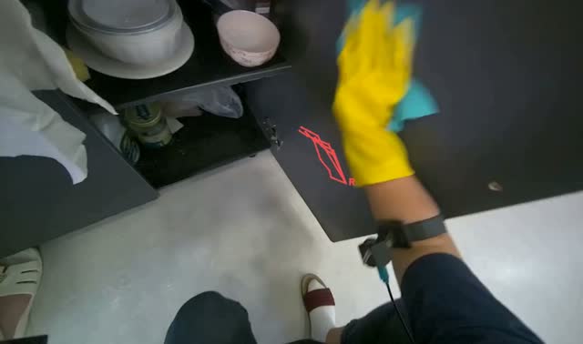 Cleaning kitchen cabinet interior: egocentric robotics sample