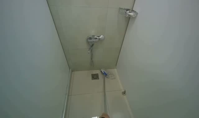 Mopping shower stall floor: egocentric robotics sample