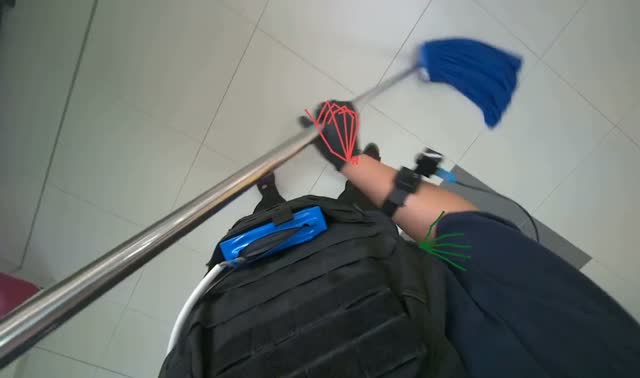 Mopping floor with string mop: egocentric robotics sample