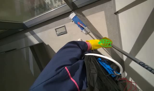 Mopping floor with flat mop: egocentric robotics sample