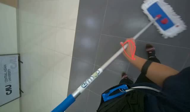 Mopping floor with flat mop: egocentric robotics sample