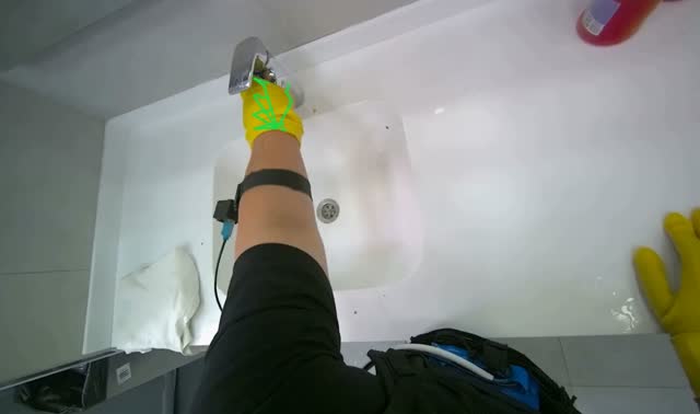 Scrubbing bathroom sinks and counter: egocentric robotics sample