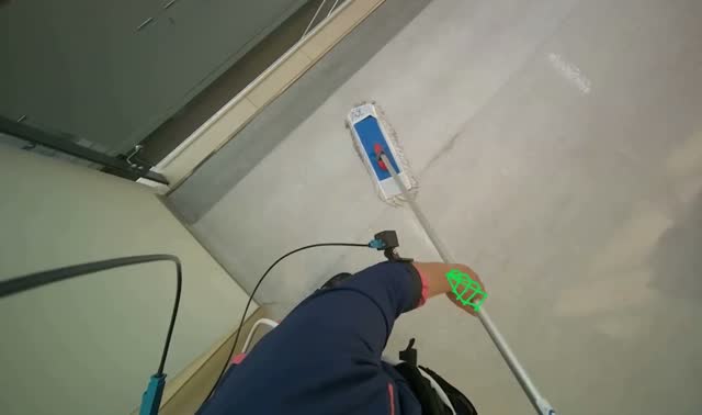 Mopping floor with flat mop: egocentric robotics sample