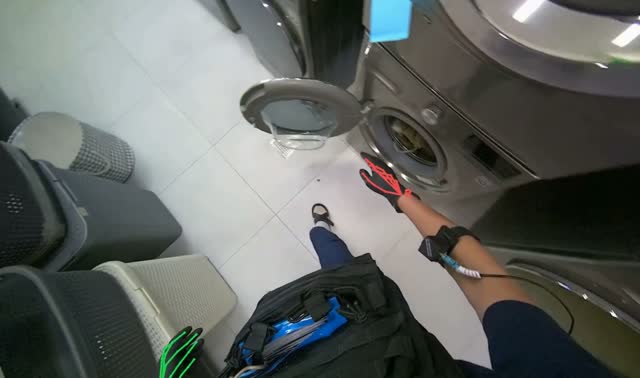 Operating washing machine controls: egocentric robotics sample