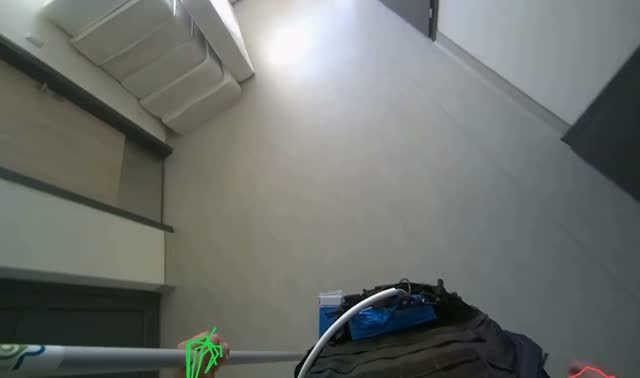 Mopping floor with flat mop: egocentric robotics sample