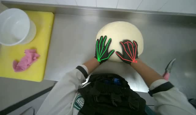 Shaping dough on counter: egocentric robotics sample
