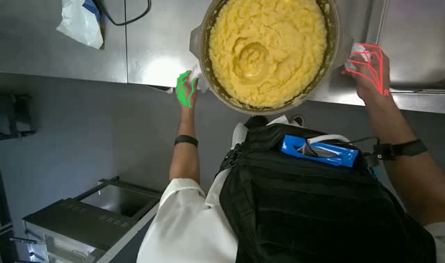 Transferring mashed potatoes into tray: egocentric robotics sample