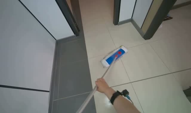 Mopping hallway floor: egocentric robotics sample