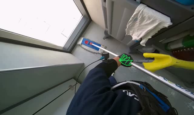 Mopping bathroom floor: egocentric robotics sample