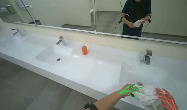 Wiping bathroom countertop: egocentric robotics sample