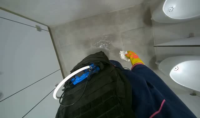 Wiping down toilet: egocentric robotics sample