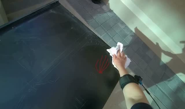 Preparing cloth and wiping outdoor tables: egocentric robotics sample
