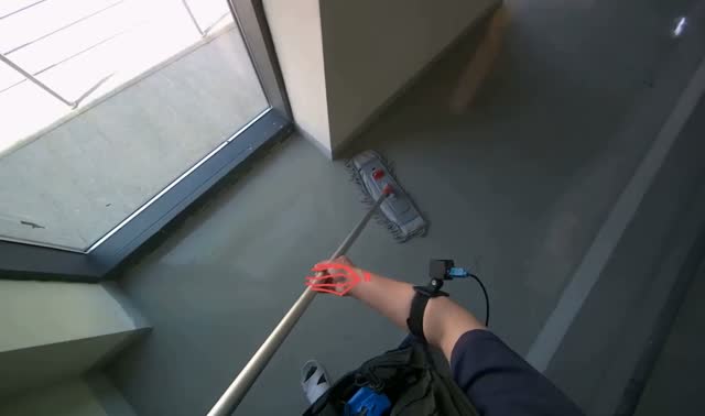 Mopping floor near window: egocentric robotics sample