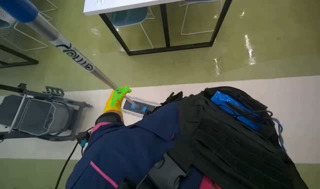 Mopping floor with flat mop: egocentric robotics sample