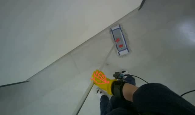 Mopping hallway floor: egocentric robotics sample