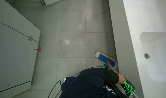 Mopping bathroom floor: egocentric robotics sample